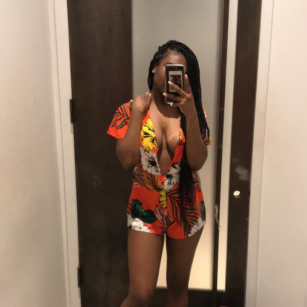 Super cute orange floral romper